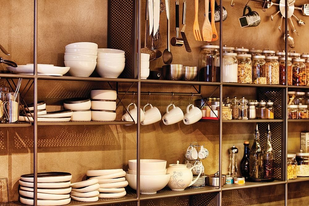 Simple-and-extensive-storage-system-with-iron-rods-and-shelves-in-the-kitchen