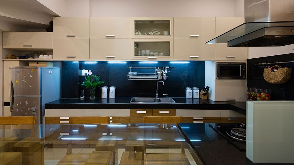 White-cabinets-and-a-dark-backsplash-fashion-a-cool-modern-kitchen